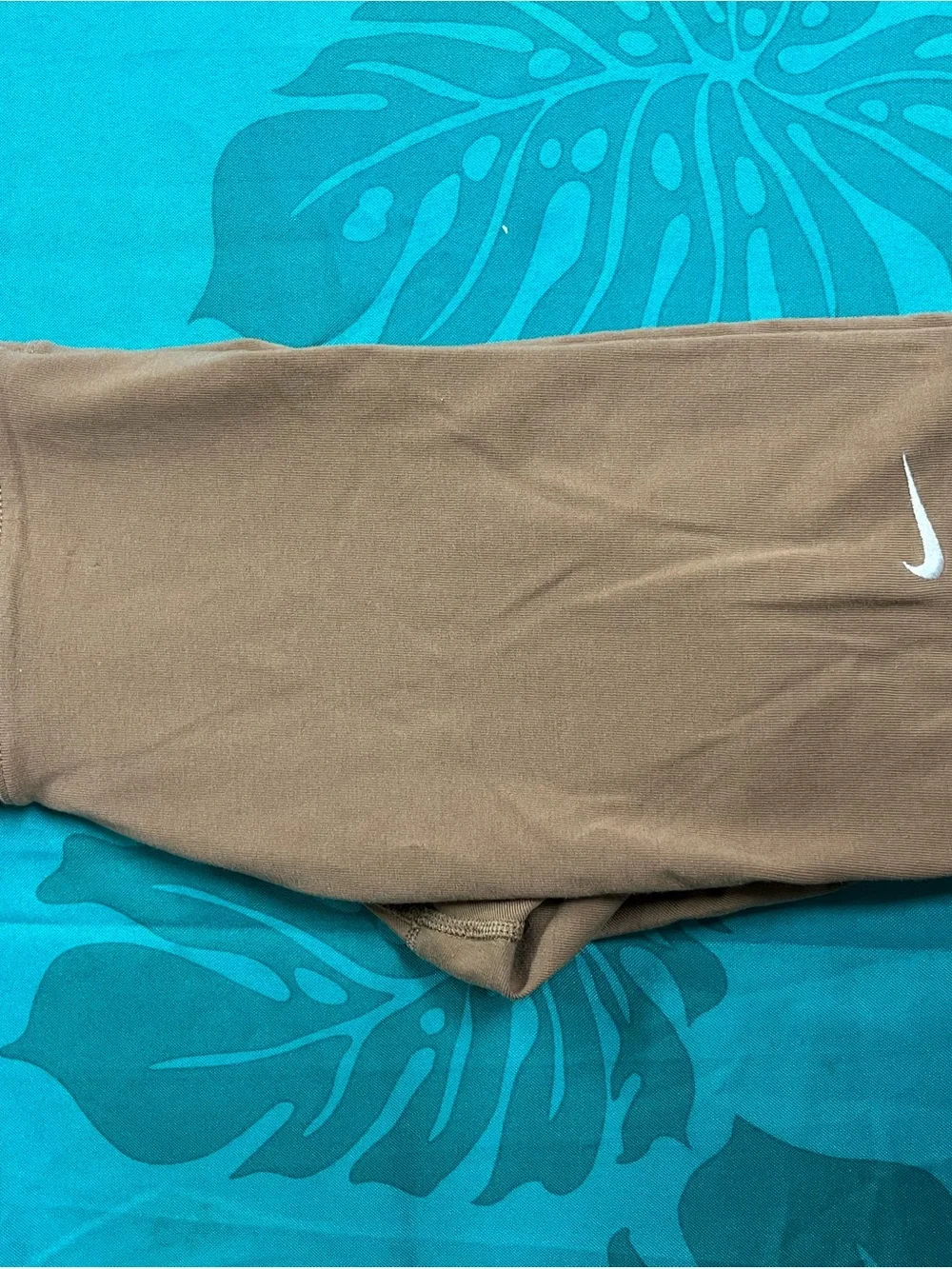 Nike women’s Tan Joggers with White Swoosh
